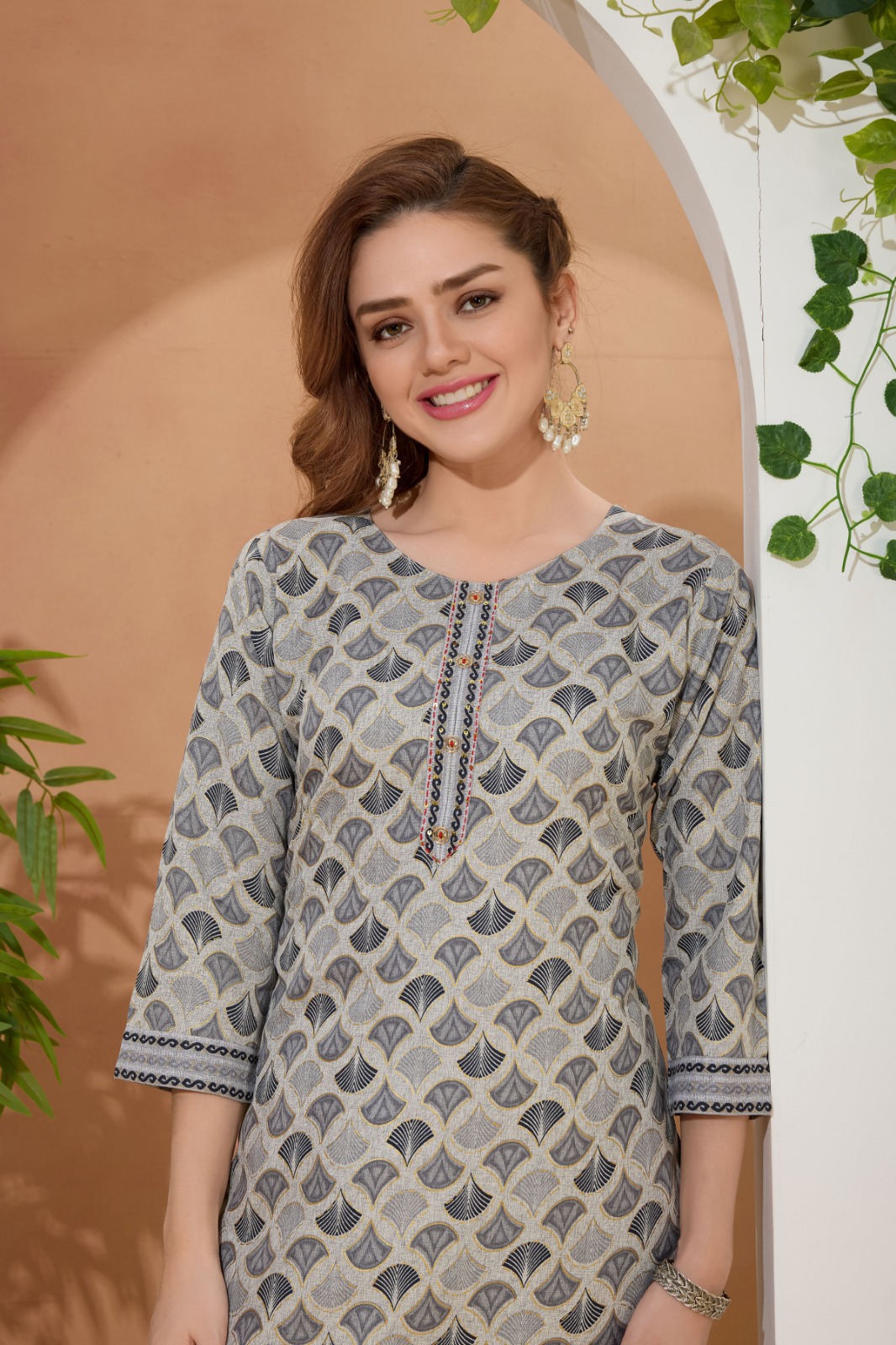 Sway Gray Round Neck Kurti Pant Suit For Women. Embellished with Golden Beads and Thread Work.