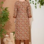 Dusty Rust V Neck Kurti Pant Suit For Women. Embellished with Decorative Golden Beads and Thread Work.
